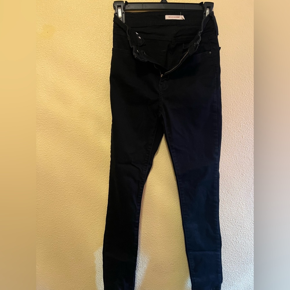 Black Skinny Jeans
Size W 27 L 30